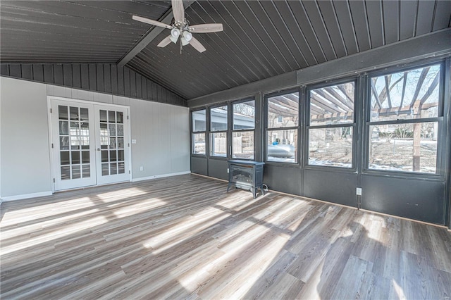 unfurnished sunroom with lofted ceiling, french doors, and ceiling fan