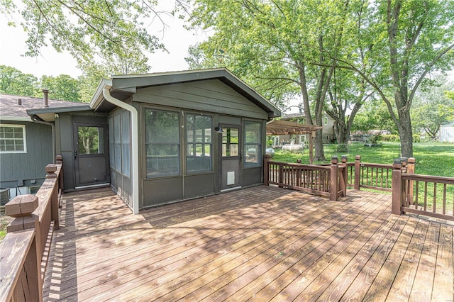 wooden terrace with a sunroom