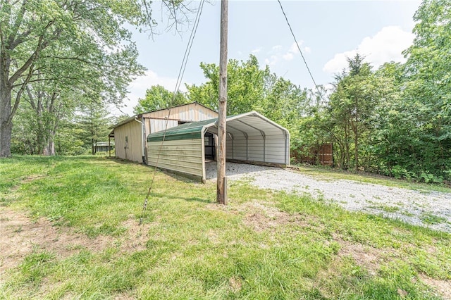 view of yard with a carport