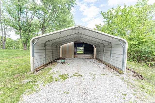 view of vehicle parking featuring a carport and a lawn