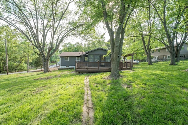 view of yard with a deck