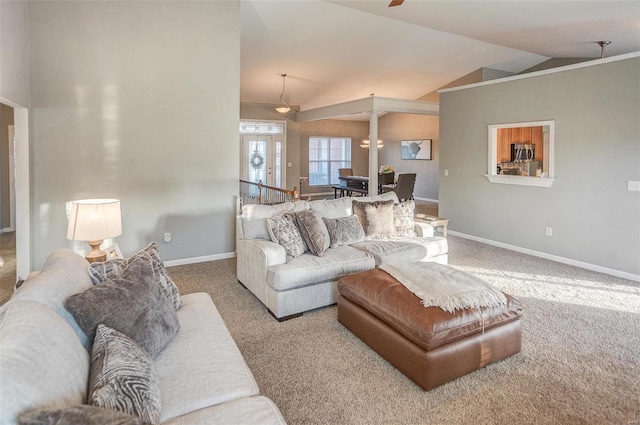 living room with carpet flooring and lofted ceiling