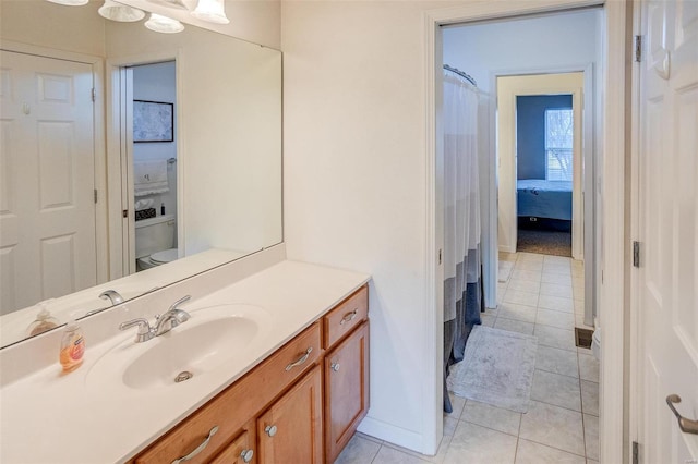 bathroom featuring tile patterned floors and vanity