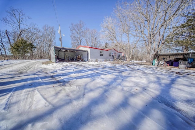 exterior space with a carport