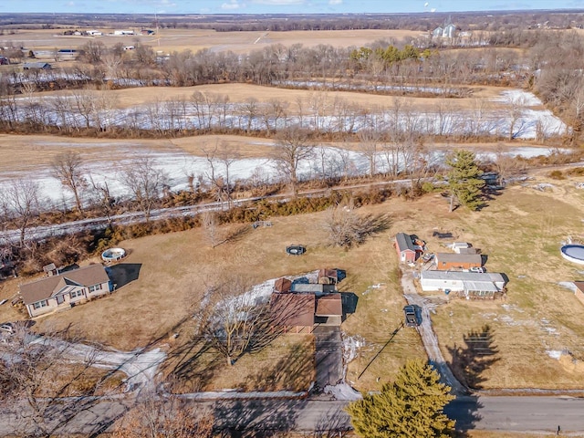 birds eye view of property featuring a rural view