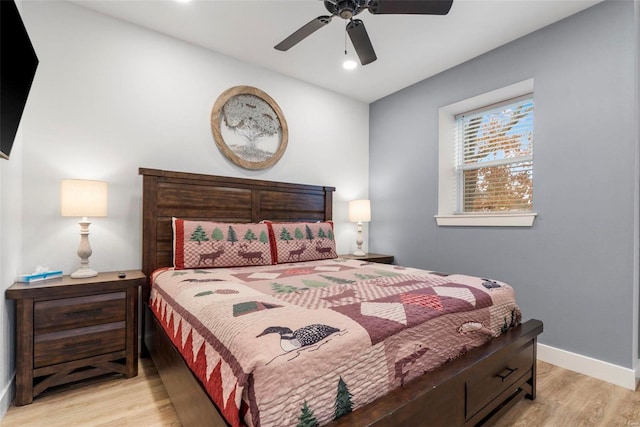 bedroom featuring light hardwood / wood-style floors and ceiling fan