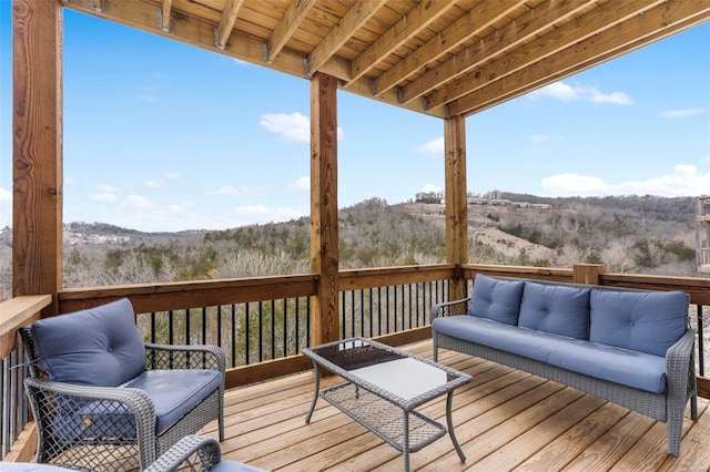 deck featuring outdoor lounge area