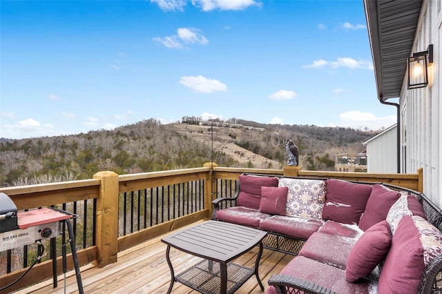 deck featuring outdoor lounge area