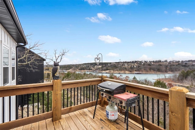 deck featuring a water view