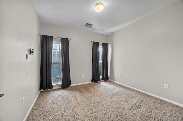 unfurnished room with carpet