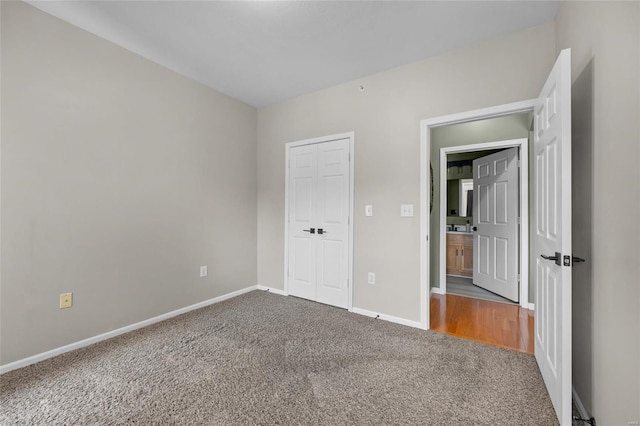 unfurnished bedroom featuring carpet