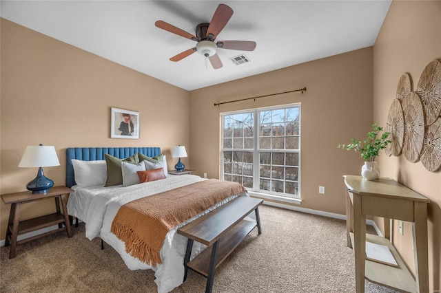 carpeted bedroom with ceiling fan