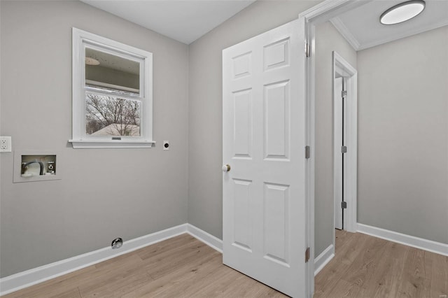 washroom featuring hookup for a washing machine, light hardwood / wood-style flooring, and hookup for an electric dryer