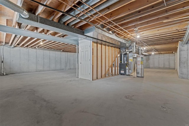 basement with heating unit and gas water heater