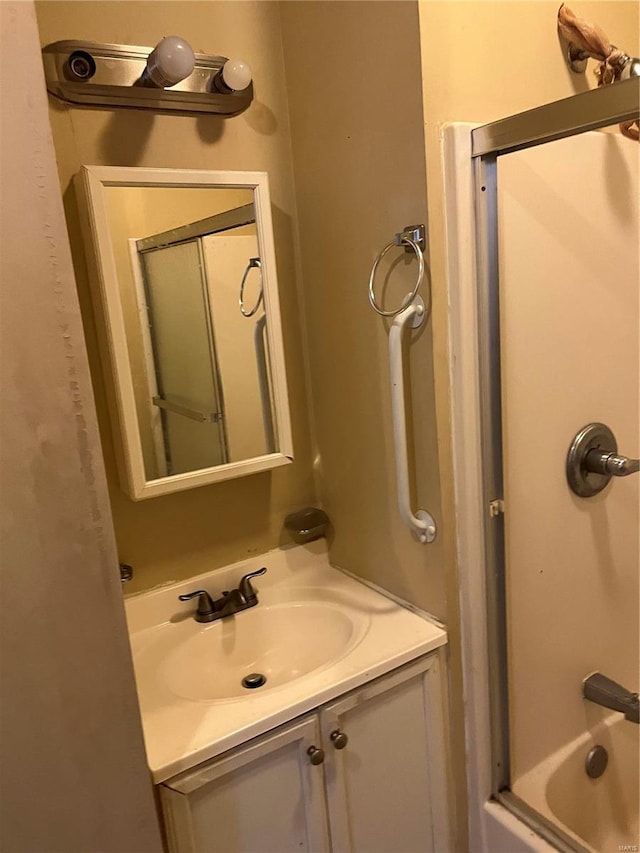 bathroom featuring vanity and shower / bathtub combination