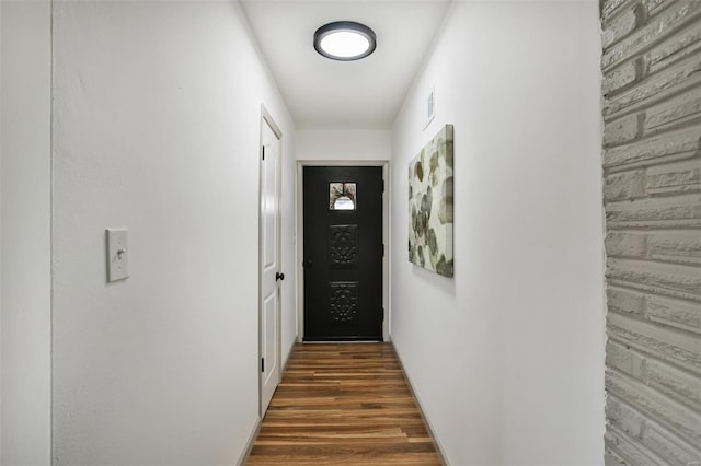 entryway with dark hardwood / wood-style floors