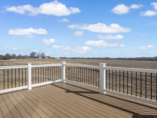 wooden terrace with a rural view