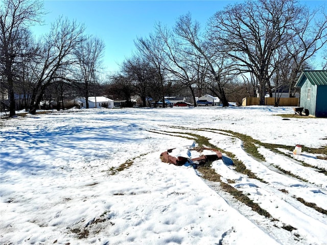 view of yard covered in snow