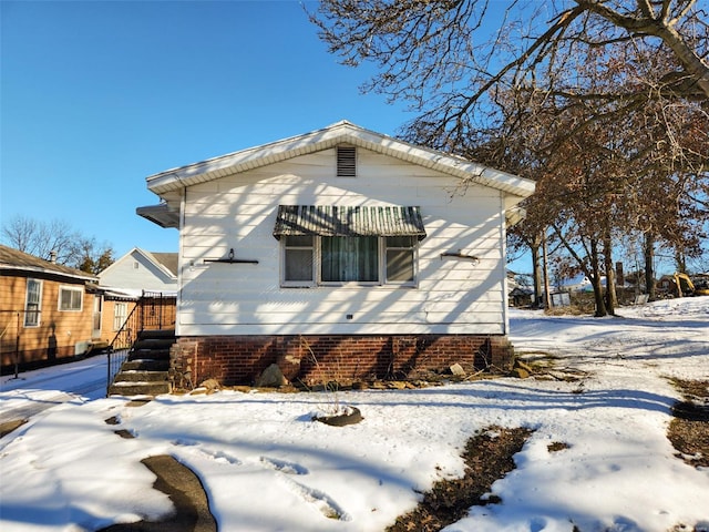 view of snowy exterior