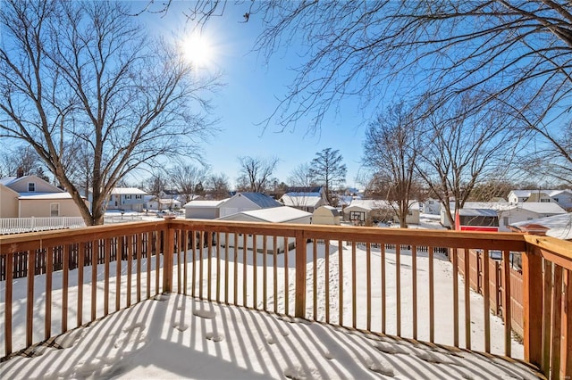 view of snow covered deck