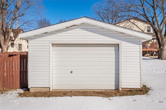 view of snow covered garage