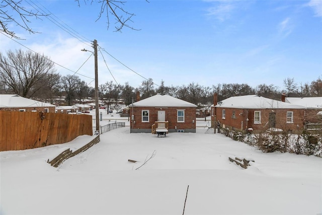 view of snow covered property