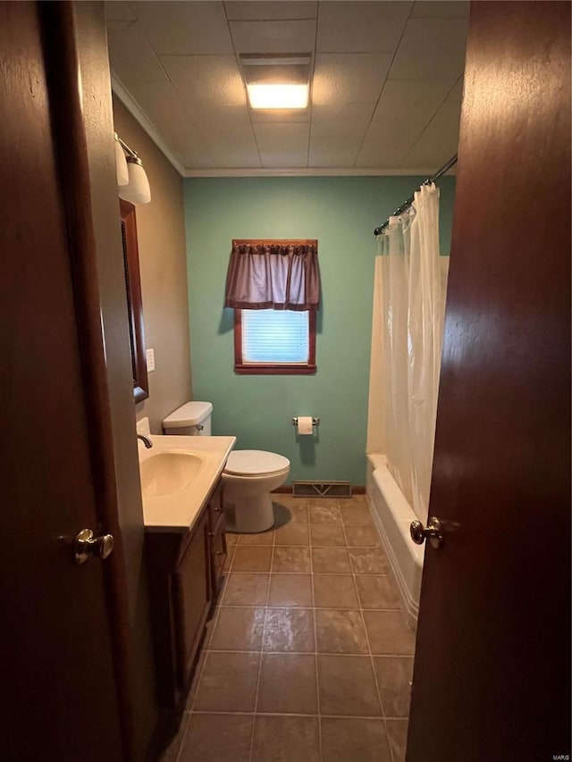 full bathroom with vanity, shower / bath combination with curtain, toilet, and crown molding