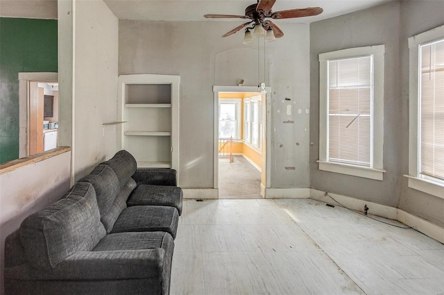 living room featuring ceiling fan