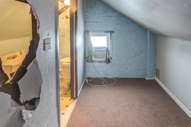 bonus room featuring carpet flooring and lofted ceiling