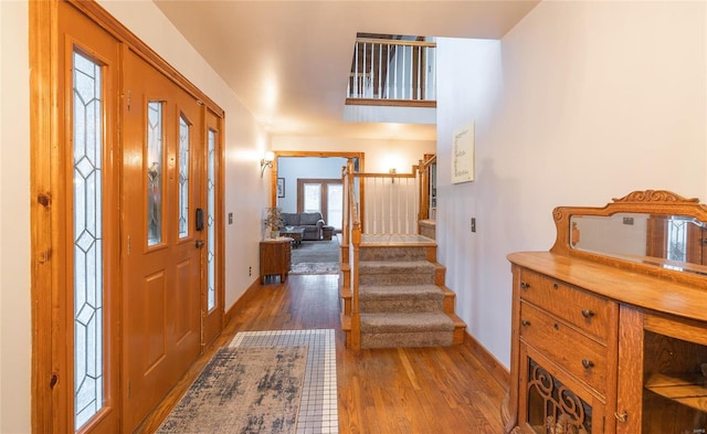 entrance foyer featuring hardwood / wood-style flooring