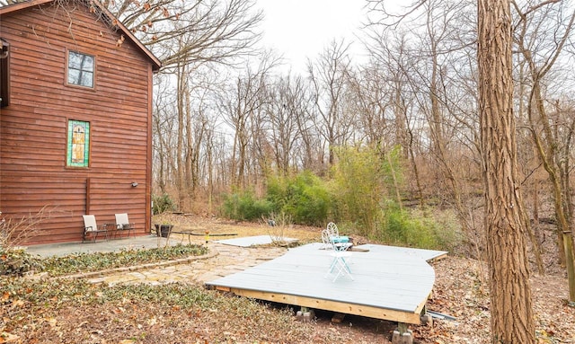 view of yard with a patio and a deck