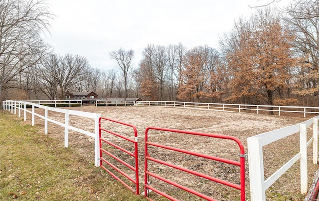 view of yard with a rural view