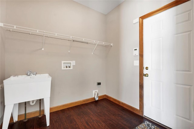 clothes washing area with electric dryer hookup, hookup for a washing machine, and hardwood / wood-style floors