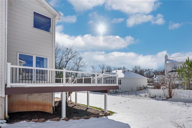 view of snow covered deck