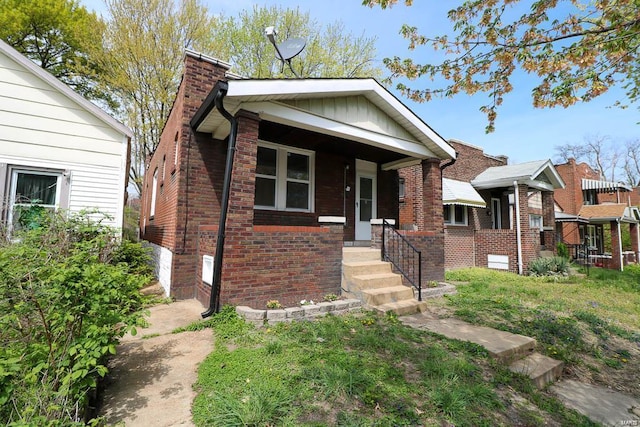 bungalow-style home with covered porch