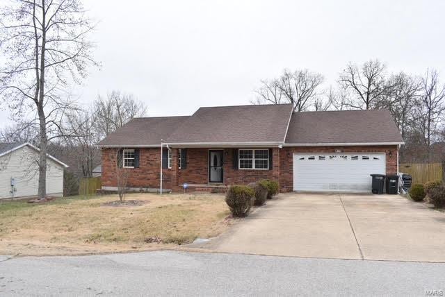 ranch-style house with a garage