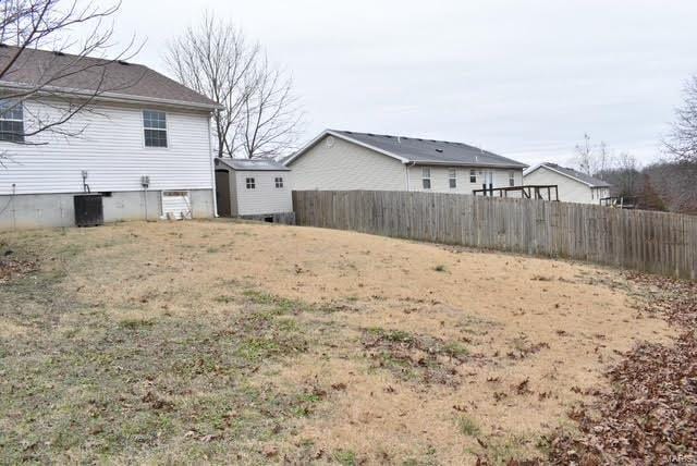 view of yard featuring central AC