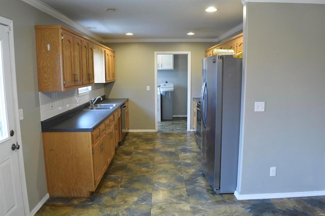 kitchen featuring sink, ornamental molding, stainless steel appliances, and tasteful backsplash