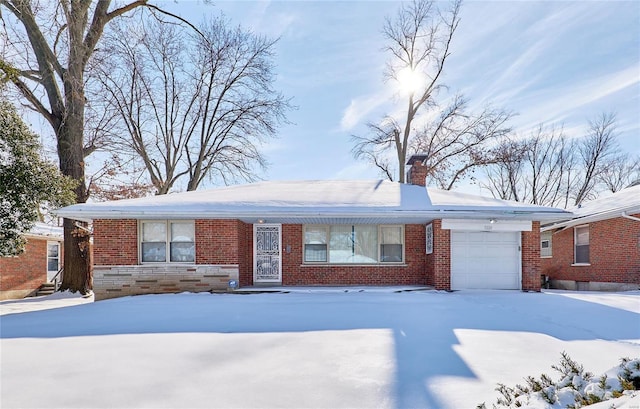 single story home featuring a garage