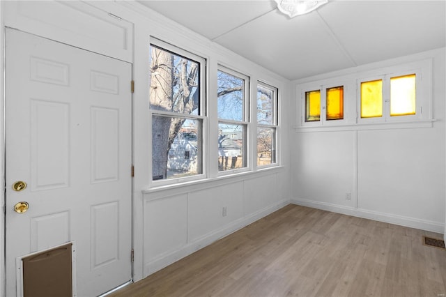 unfurnished room featuring light hardwood / wood-style floors