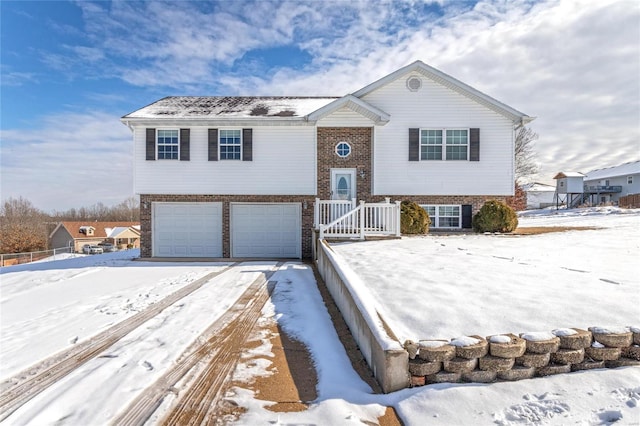 bi-level home featuring a garage