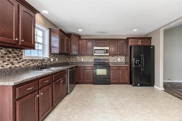 kitchen featuring sink and black appliances