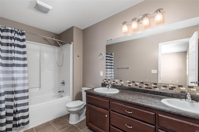 full bathroom featuring decorative backsplash, tile patterned floors, vanity, shower / bathtub combination with curtain, and toilet