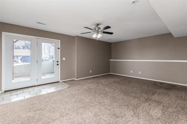 unfurnished room featuring carpet flooring and ceiling fan