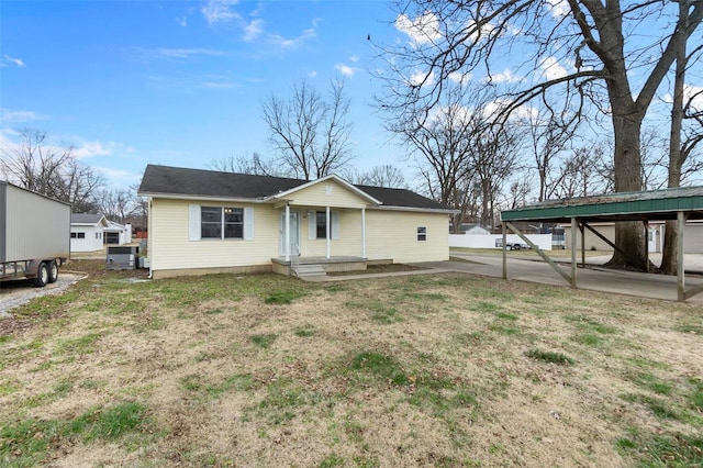 view of front of home featuring a carport