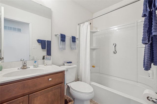 full bathroom featuring vanity, shower / bath combination with curtain, and toilet