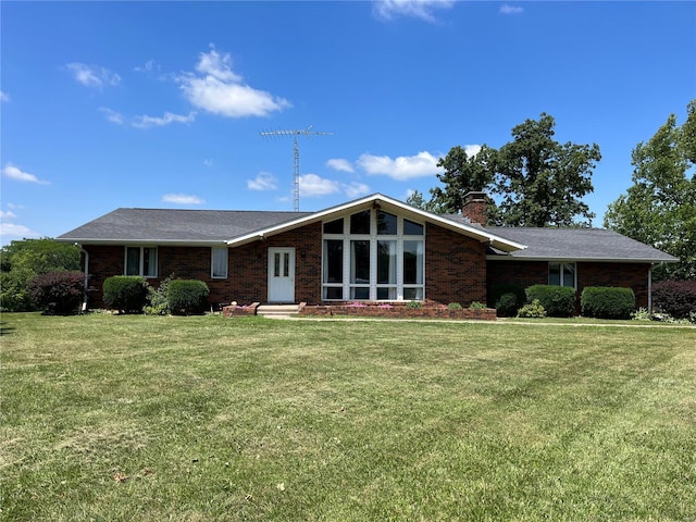 ranch-style house with a front yard