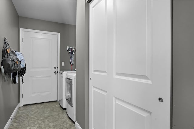 laundry room with washer and clothes dryer