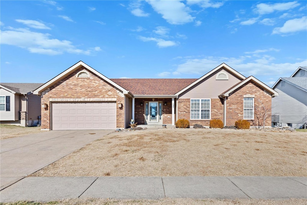 single story home featuring a garage and central AC