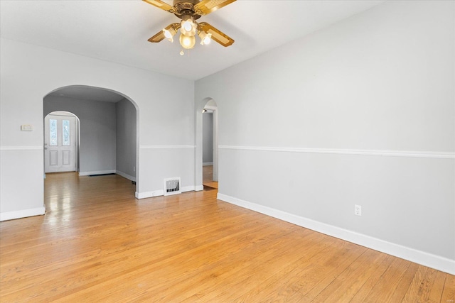 unfurnished room featuring light hardwood / wood-style flooring and ceiling fan